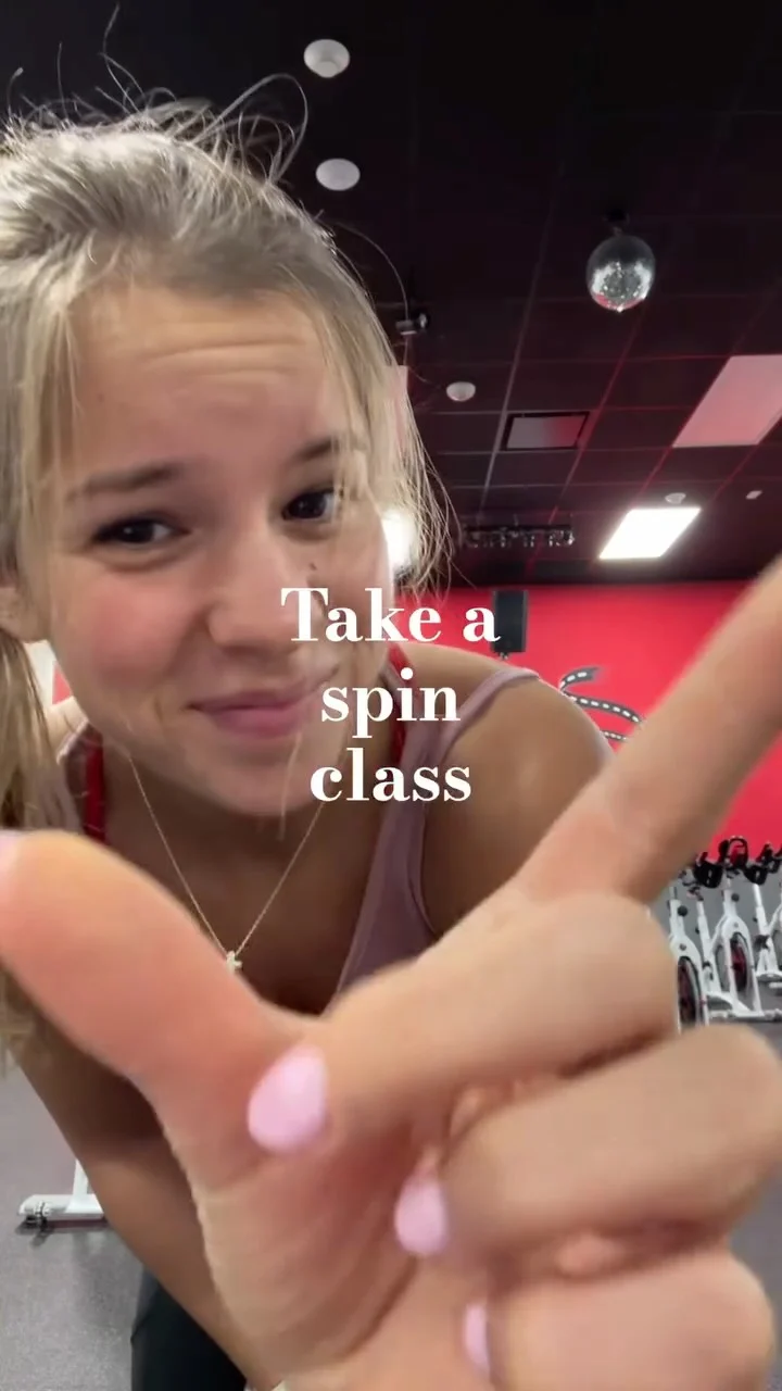 Julia Lynn in a gym in her take a spin class reel